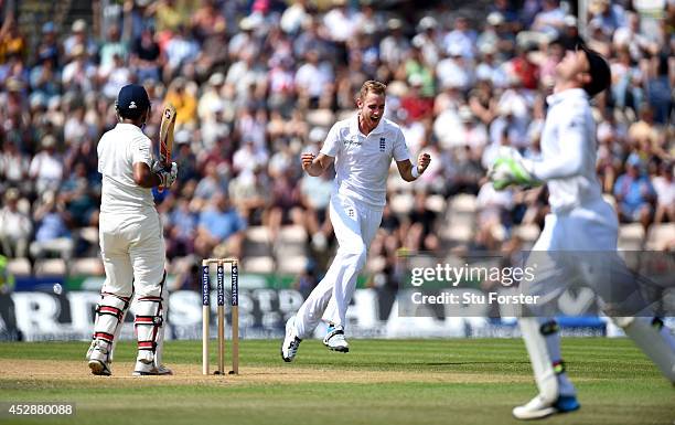 England bowler Stuart Broad celebrates after having India batsman Cheteshwar Pujara caught by Jos Buttler to claim his 250th test wicket during day...