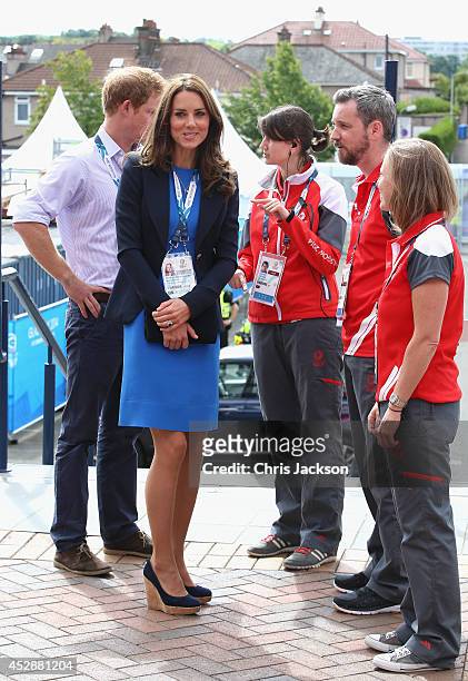Catherine, Duchess of Cambridge meets Commonwealth Games volunteers as she arrives at Hampden Park for the athletics on day six of the Commonwealth...