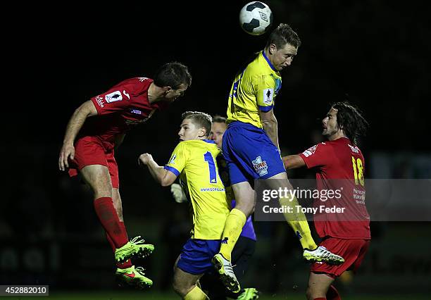 Christopher Maher of Brisbane heads the ball during the FFA Cup match between Broadmeadow and Brisbane Strikers at Wanderers Oval on July 29, 2014 in...