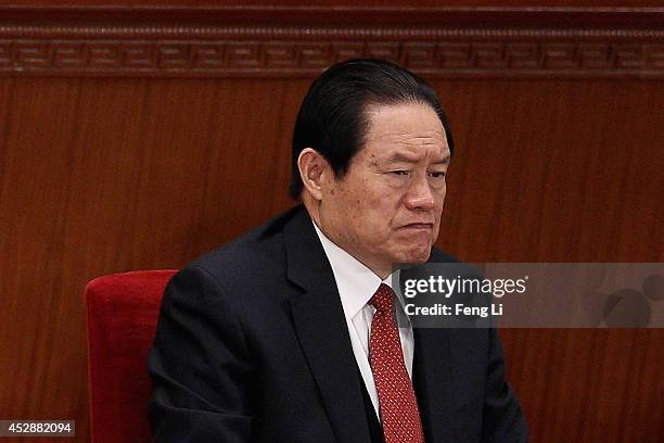 Zhou Yongkang, one of the members of the nine-seat Politburo Standing Committee, attends the opening ceremony of the Chinese People's Political...