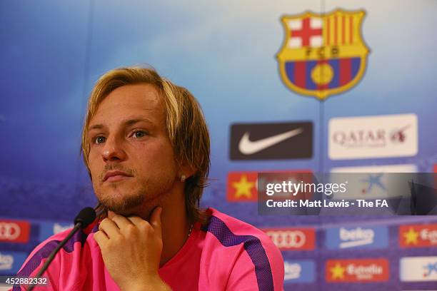 Ivan Rakitic of Barcelona talks to the media during a Barcelona Training Session at St Georges Park on July 29, 2014 in Burton-upon-Trent, England.