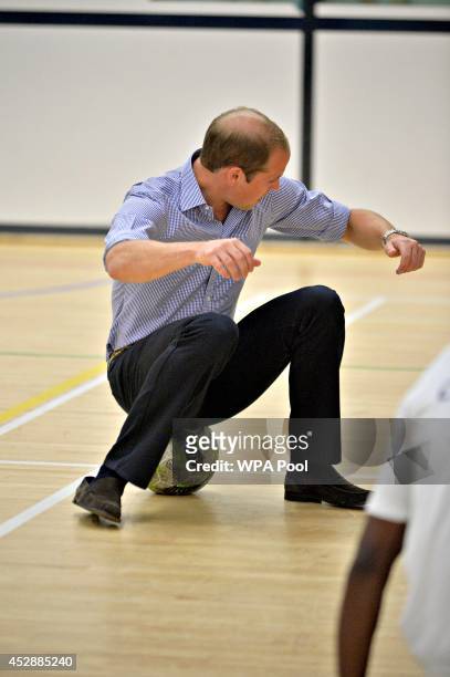 Prince William, Duke of Cambridge is seen during a visit to the Coach Core project at Gorbals Leisure Centre on July 29, 2014 in Glasgow, Scotland.