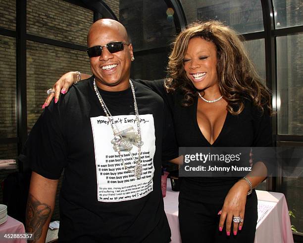 Husband/manager Kevin Hunter and Wendy Williams during Wendy Williams's Signs to Alize as National Spokesperson at Kobrand Headquarters in New York...