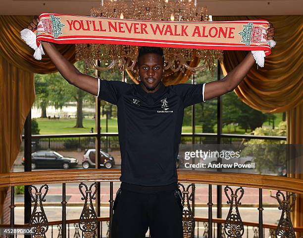 New signing of Liverpool Divock Origi poses for a photograph as he is unveiled on July 29, 2014 in Boston, Massachusetts.