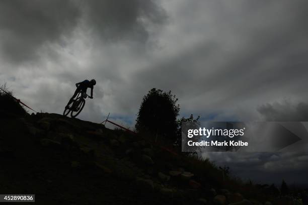 General view is seen as a competitor races in the Men's Cross-country Mountain Biking at Cathkin Braes Mountain Bike Trails during day six of the...