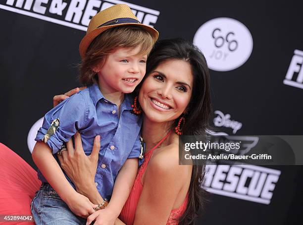 Personality Joyce Giraud and son Leonardo Ohoven attend the premiere of 'Planes: Fire & Rescue' at the El Capitan Theatre on July 15, 2014 in...