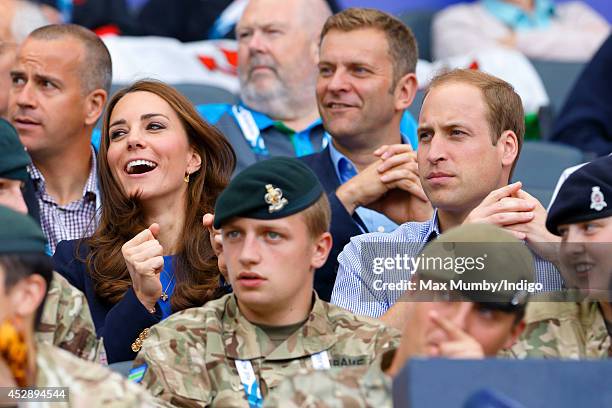 Catherine, Duchess of Cambridge and Prince William, Duke of Cambridge watch the athletics at Hampden Park during the 20th Commonwealth Games on July...