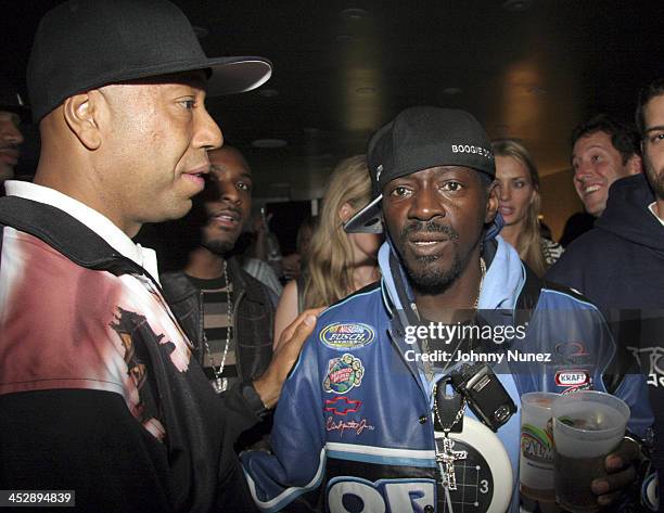 Russell Simmons and Flavor Flav during Phat Farm Party for Magic 06 - February 22, 2006 at Palm Hotel Hard wood Suite in Las Vegas, Nerevada, United...