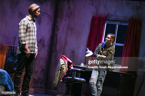Actor Troy Baker and actress Ashley Johnson perform a surprise alternative ending to The Last of US at The Broad Stage on July 28, 2014 in Santa...