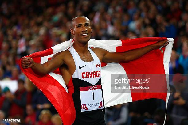 Overall Gold medalist Damian Warner of Canada celebrates after the Men's Decathlon 1500 metres at Hampden Park during day six of the Glasgow 2014...