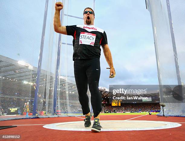 Jim Steacy of Canada celebrates in the Men's Hammer final at Hampden Park during day six of the Glasgow 2014 Commonwealth Games on July 29, 2014 in...