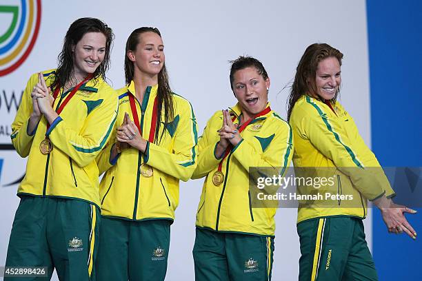 Gold medallists Cate Campbell, Emma McKeon, Lorna Tonks and Emily Seebohm of Australia pose during the medal ceremony for the Women's 4 x 100m Medley...