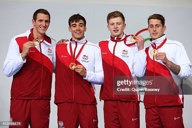 Gold medallists Adam Brown, Adam Barrett, Adam Peaty and Chris Walker-Hebborn of England pose during the medal ceremony for the Men's 4 x 100m Medley...