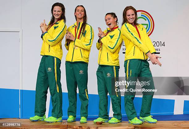 Gold medallists Cate Campbell, Emma McKeon, Lorna Tonks and Emily Seebohm of Australia pose during the medal ceremony for the Women's 4 x 100m Medley...