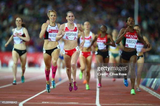 Silver medalist Laura Weightman of England and gold medalist Faith Kibiegon of Kenya sprint to the finish line in the Women's 1500 metres final at...
