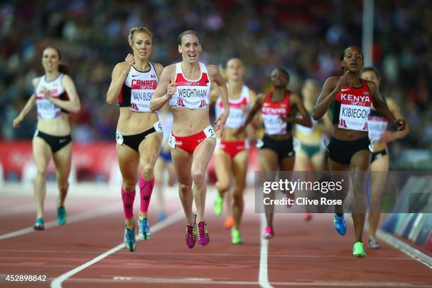 Silver medalist Laura Weightman of England and gold medalist Faith Kibiegon of Kenya sprint to the finish line in the Women's 1500 metres final at...