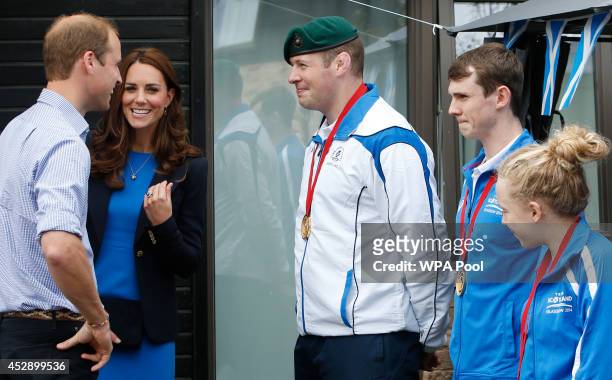 Prince William, Duke of Cambridge and Catherine, Duchess of Cambridge meet medal winners Chris Sherrington, Ross Murdoch and Erraid Davies during a...