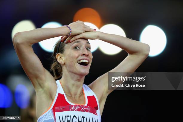 Laura Weightman of England celebrates winning silver in the Women's 1500 metres final at Hampden Park during day six of the Glasgow 2014 Commonwealth...