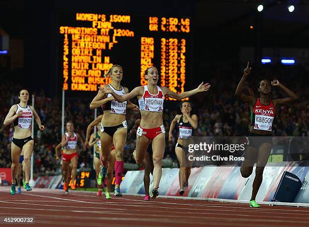 Bronze medalist Kate van Buskirk of Canada, Silver medalist Laura Weightman of England and gold medalist Faith Kibiegon of Kenya react as they cross...