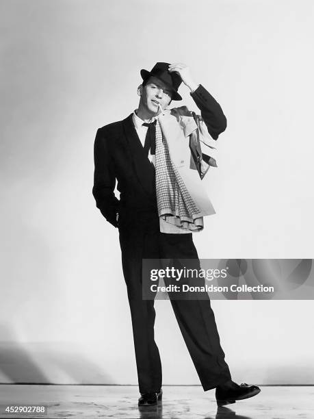 Singer and actor Frank Sinatra poses for a publicity still for the movie 'Pal Joey' in 1957 in Los Angeles, California. /Getty Images)