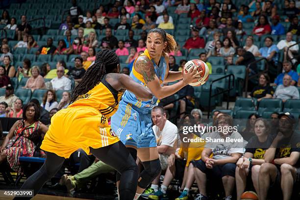 Courtney Clements of the Chicago Sky controls the ball against the Tulsa Shock on July 27, 2014 at the BOK Center in Tulsa, Oklahoma. NOTE TO USER:...