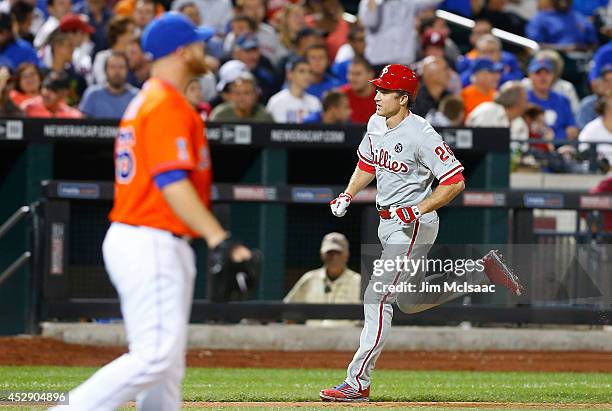 Chase Utley of the Philadelphia Phillies runs the bases after his seventh inning grand slam against Josh Edgin of the New York Mets at Citi Field on...