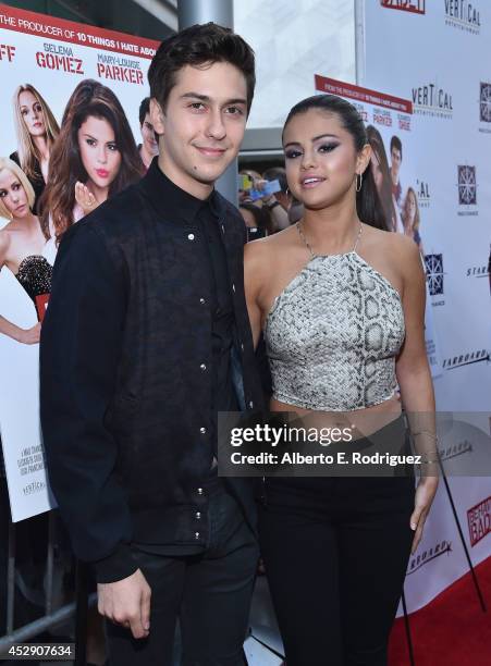 Actors Nat Wolff and Selena Gomez arrive to the premiere of Mad Chance's "Behaving Badly" at the ArcLight Hollywood on July 29, 2014 in Hollywood,...