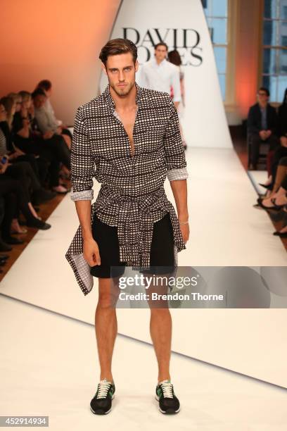 Model Zac Stenmark showcases designs by Vanishing Elephant during a rehearsal ahead of the David Jones Spring/Summer 2014 Collection Launch at David...