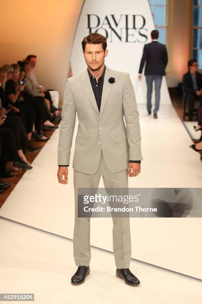 Model Jason Dundas showcases designs by Calibre during a rehearsal ahead of the David Jones Spring/Summer 2014 Collection Launch at David Jones...
