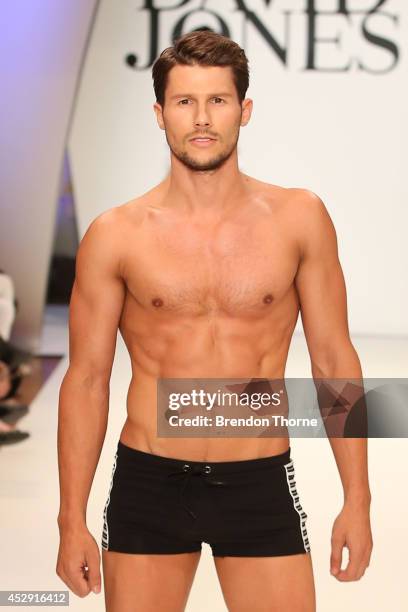 Model Jason Dundas showcases designs by Jets during a rehearsal ahead of the David Jones Spring/Summer 2014 Collection Launch at David Jones...