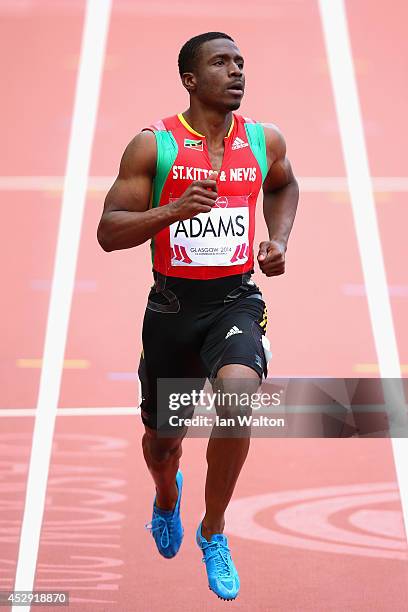 Antoine Adams of St Kitts and Nevis competes in the Men's 200 metres heats at Hampden Park during day seven of the Glasgow 2014 Commonwealth Games on...