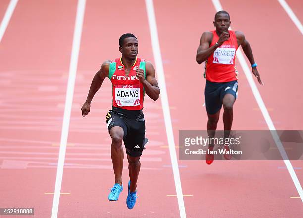 Antoine Adams of St Kitts and Nevis competes in the Men's 200 metres heats at Hampden Park during day seven of the Glasgow 2014 Commonwealth Games on...
