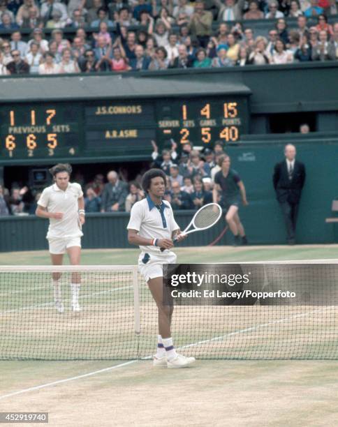 Arthur Ashe of the United States after playing his winning shot to defeat Jimmy Connors of the United States to win the Men's Singles Final on Centre...