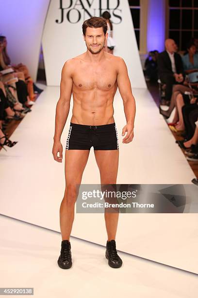 Jason Dundas showcases designs by Jets at the David Jones Spring/Summer 2014 Collection Launch at David Jones Elizabeth Street Store on July 30, 2014...