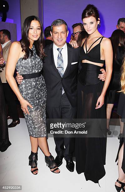 Jessica Gomes, Paul Zahra and Montana Cox pose after the David Jones Spring/Summer 2014 Collection Launch at David Jones Elizabeth Street Store on...