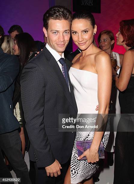 Michael Miziner and Rachael Finch pose after the David Jones Spring/Summer 2014 Collection Launch at David Jones Elizabeth Street Store on July 30,...