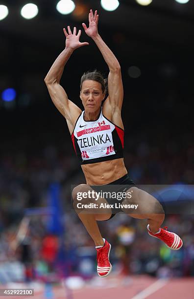 Jessica Zelinka of Canada competes in the Women's Heptathlon Long Jump at Hampden Park during day seven of the Glasgow 2014 Commonwealth Games on...