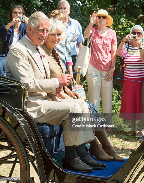 Prince Charles, Prince of Wales and Camilla, Duchess of Cornwall attend the Sandringham Flower Show at Sandringham on July 29, 2014 in King's Lynn,...