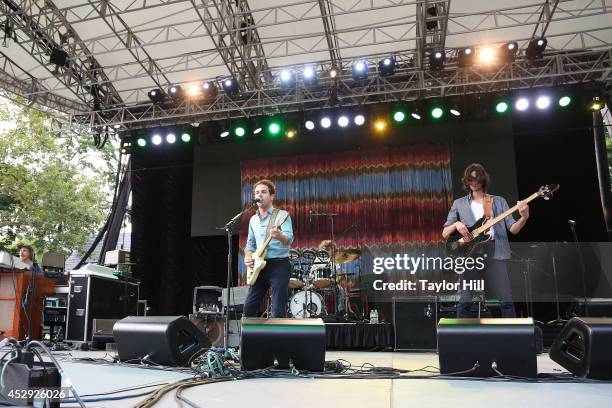 Tay Strathairn, Taylor Goldsmith, Griffin Goldsmith, and Wylie Gelber of Dawes perform at Central Park SummerStage on July 29, 2014 in New York City.