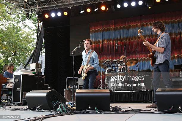 Tay Strathairn, Taylor Goldsmith, Griffin Goldsmith, and Wylie Gelber of Dawes perform at Central Park SummerStage on July 29, 2014 in New York City.