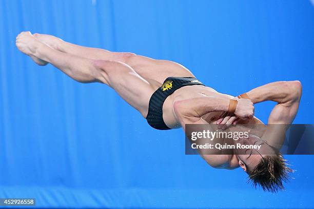 Matthew Mitcham of Australia competes in the Men's 1m Springboard Preliminaries at Royal Commonwealth Pool during day seven of the Glasgow 2014...