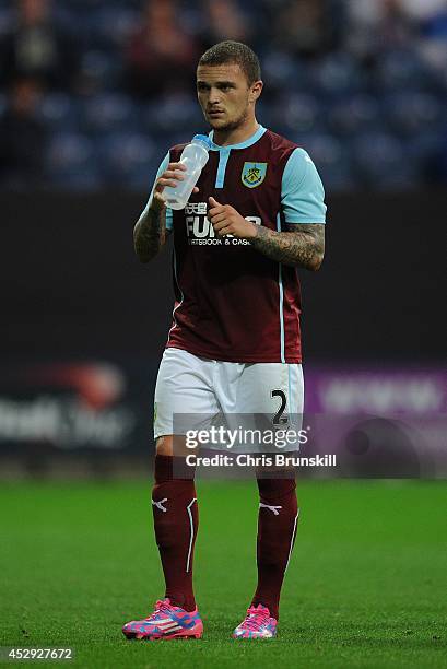 Kieran Trippier of Burnley takes a drink during the pre season friendly match between Preston North End and Burnley at Deepdale on July 29, 2014 in...