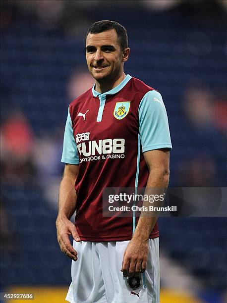 Dean Marney of Burnley in action during the pre season friendly match between Preston North End and Burnley at Deepdale on July 29, 2014 in Preston,...