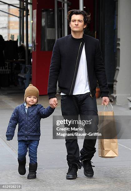 Orlando Bloom and Flynn Bloom are seen on December 01, 2013 in New York City.
