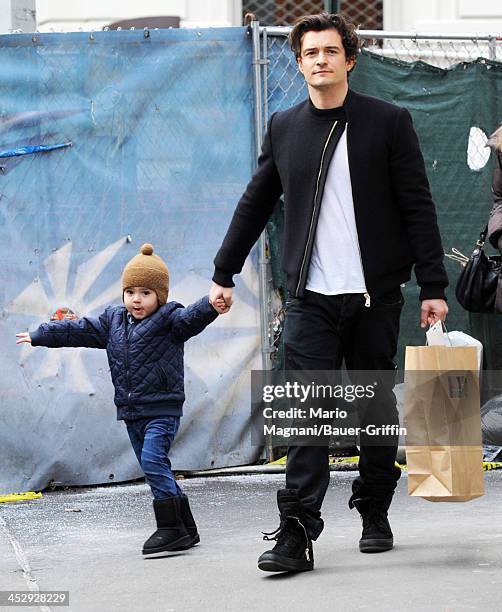 Orlando Bloom and Flynn Bloom are seen on December 01, 2013 in New York City.