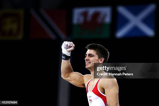 Max Whitlock of England celebrates winning the gold medal in the Men's All-Around Final at the SSE Hydro during day seven of the Glasgow 2014...