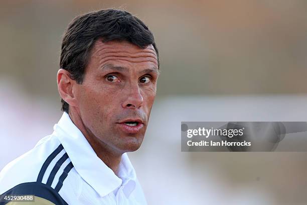 Sunderland manager Gus Poyet looks on before a pre season friendly match between CD National and Sunderland at the Estadio Municipal Albufeira on...