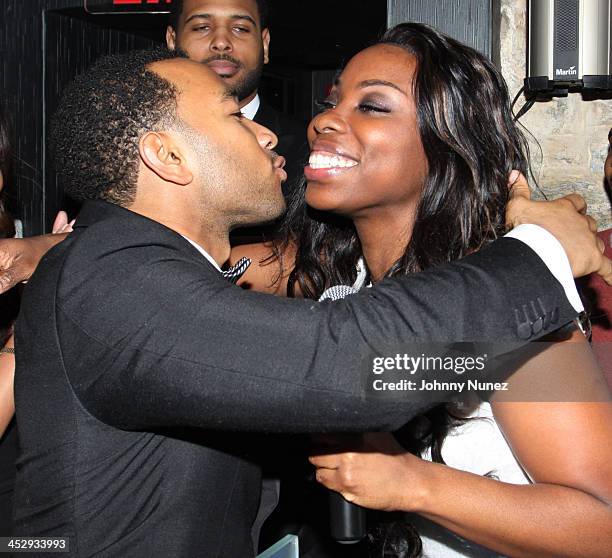 John Legend and Jessyca Wilson attend John Legend's birthday party at SL on December 28, 2009 in New York City.