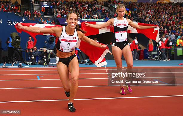 Silver medalist Jessica Zelinka of Canada and gold medalist Brianne Theisen-Eaton of Canada celebrate after the Women's Heptathlon 800 metres at...