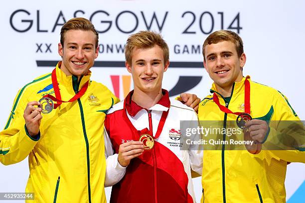 Silver medalist Matthew Mitcham of Australia, gold medalist Jack Laugher of England and bronze medalist Grant Nel of Australia pose during the medal...